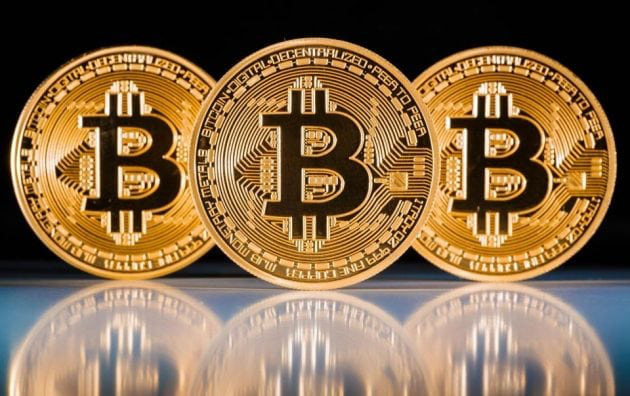 Thị trường tiền ảo ‘cháy đỏ’, Bitcoin lùi sâu về 7.500 USD - Ảnh 1.