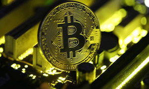 Ảnh của Bitcoin vượt đỉnh 9.000 USD