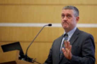 Fed's Bullard looks to a bond-buying taper not on 'automatic pilot'