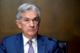 Fed's Powell sees 'sustained improvement' in economy, notable rise in inflation