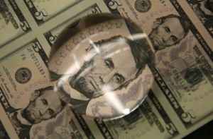 Picture of Dollar Edges Lower; Remains Elevated After Inflation Jump