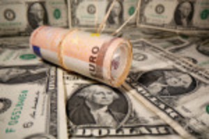 Picture of Dollar retreats further as Powell says taper 'a ways off'