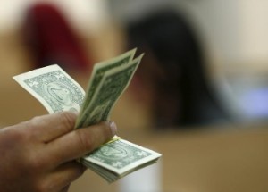 Picture of Dollar Up, Boosted by Dovish Powell Comments, Investors Digest Chinese Data