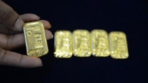 Ảnh của Vàng thế giới giảm 1% khi đồng USD tăng