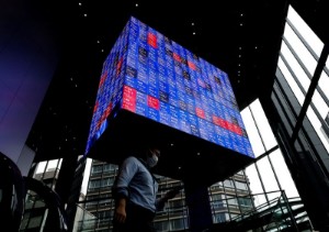 Picture of Asia shares cautious as Wall St futures slip