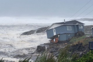 Canadians clean up after Fiona sweeps homes out to sea; one dead
