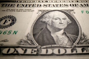 Picture of Dollar edges lower; weekly loss looms on dovish Fed