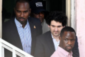 Picture of FTX's Bankman-Fried signs extradition papers as Wednesday hearing looms