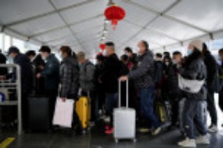 China's Lunar New Year travel offers spark of economic rebound from COVID crunch