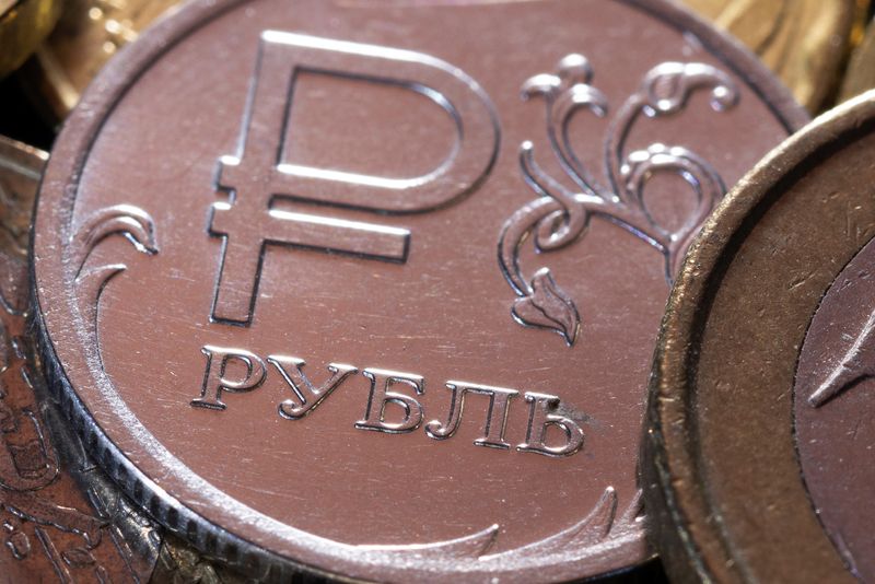 Russian rouble surges past 68 vs dollar, stocks mixed