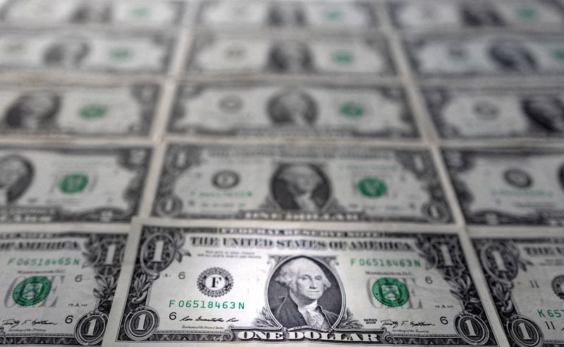 U.S. dollar slides as markets re-evaluate Fed rate path