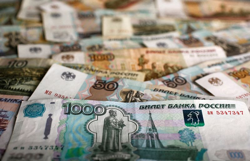 Rouble heads away from 50 vs dollar as authorities flag interventions