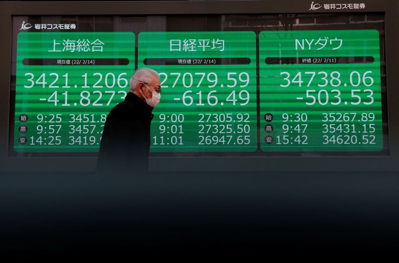 Asian stocks slide with oil on recession jitters; dollar drops