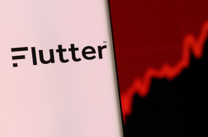 Flutter first-half earnings fall 20%, expects full-year turnaround