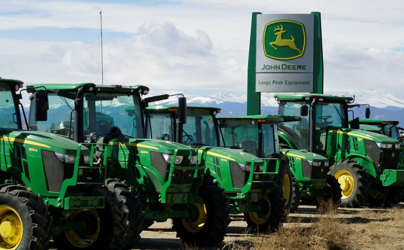 Deere cuts outlook, misses earnings with costs high and inventories low