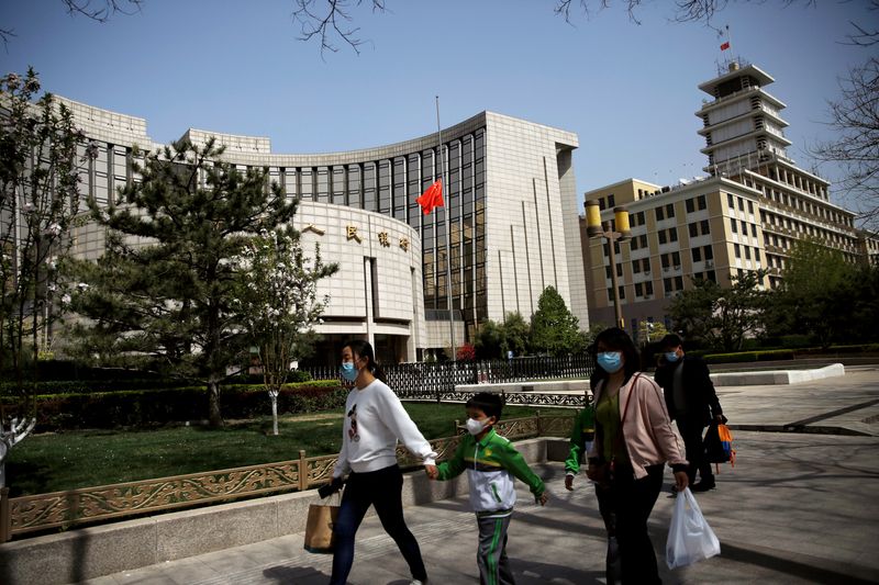 China central bank partially rolls over medium-term policy loan, rate unchanged