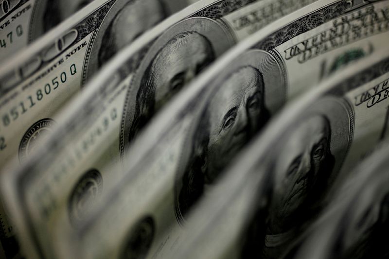 Dollar climbs as U.S. jobs report is stronger than expected