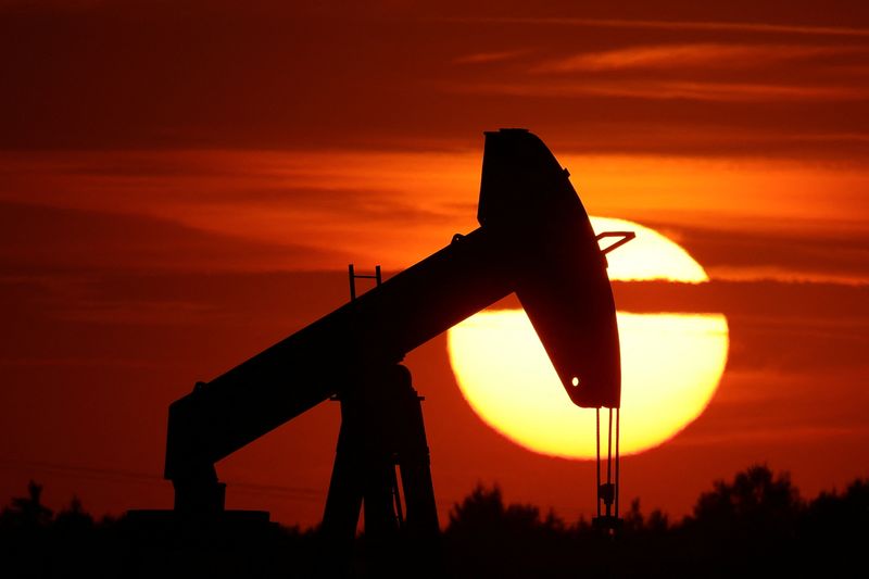 Oil slides as U.S. crude and gasoline stocks surge