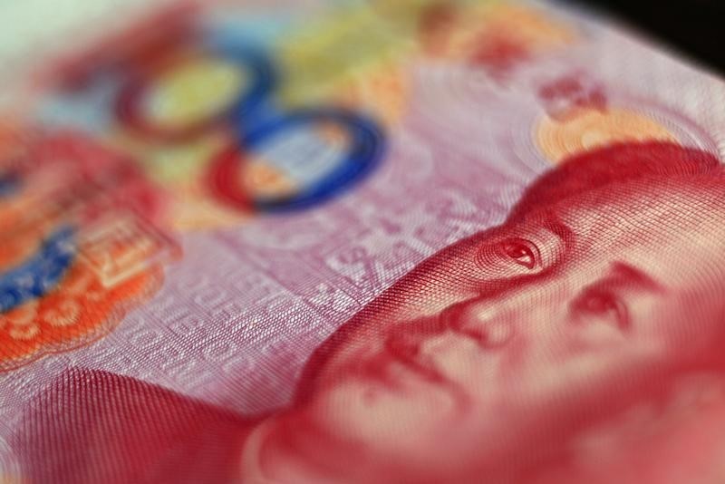 Asia FX slips, Chinese yuan surges on reopening optimism