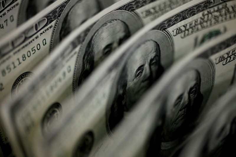 Dollar hovers near three-month low amid bets Fed will slow hikes