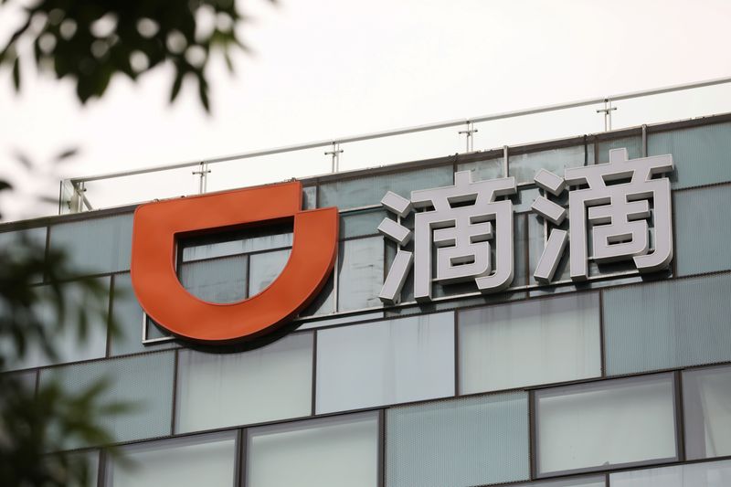 Exclusive-China to allow Didi apps back online, in latest sign of regulatory thaw-sources