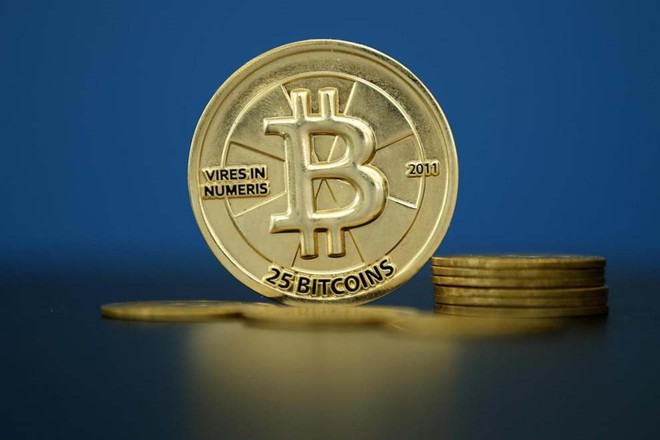 Đồng Bitcoin tăng vọt lên hơn 11.000 USD /// Ảnh: Reuters