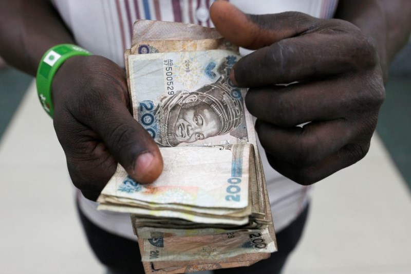 West African regional bloc adopts new plan to launch single currency in 2027