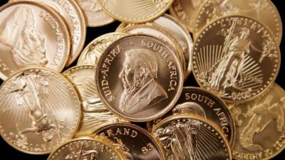Vàng thế giới tăng nhẹ khi đồng USD và lãi suất Mỹ suy yếu