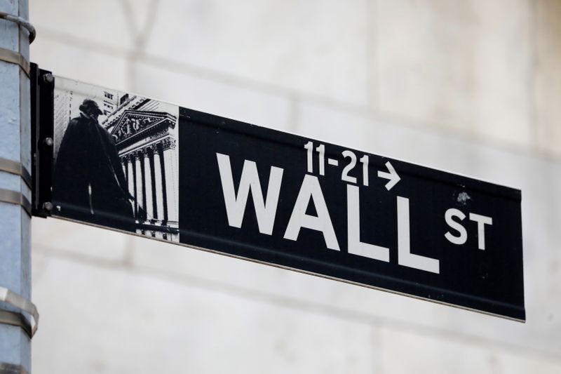 Wall Street slides, ending seesaw week in a risk-off mood
