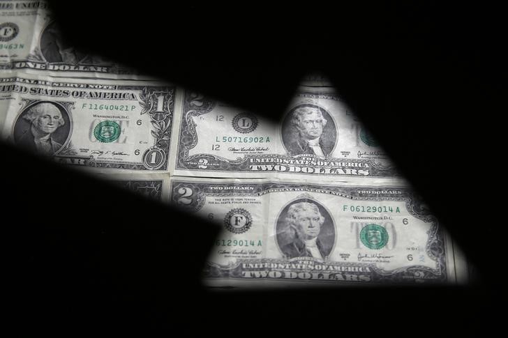 Dollar Edges Off One-Month High; Traders Digest Fed Statement