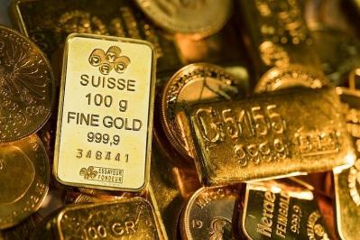 Vàng thế giới tăng khi đồng USD giảm, tăng trưởng GDP Mỹ chậm