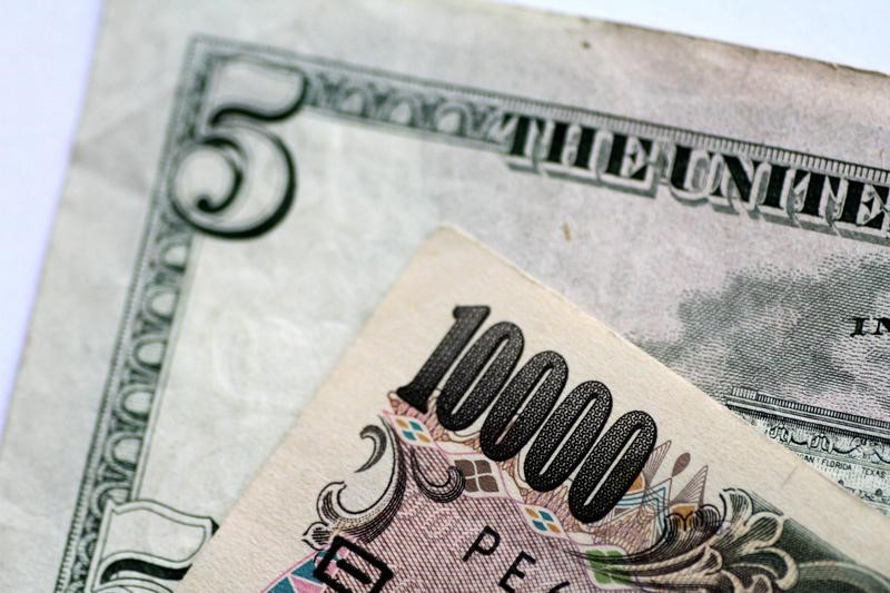 Đồng Đô la giảm, đồng Yên giảm sau khi NHTW Nhật giữ nguyên lãi suất